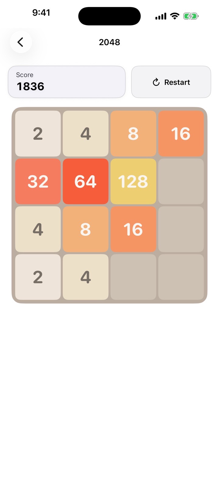 2048 game board with numbered tiles, score, and restart control
